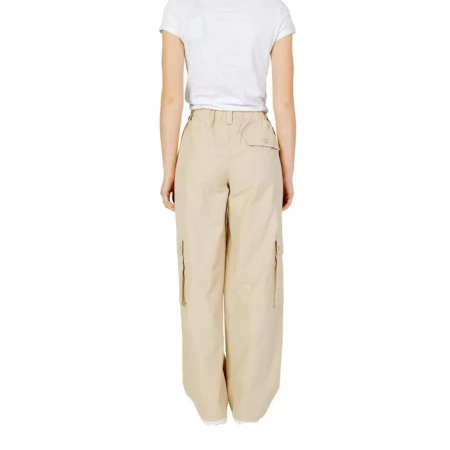 Person in khaki Only women trousers for urban city fashion