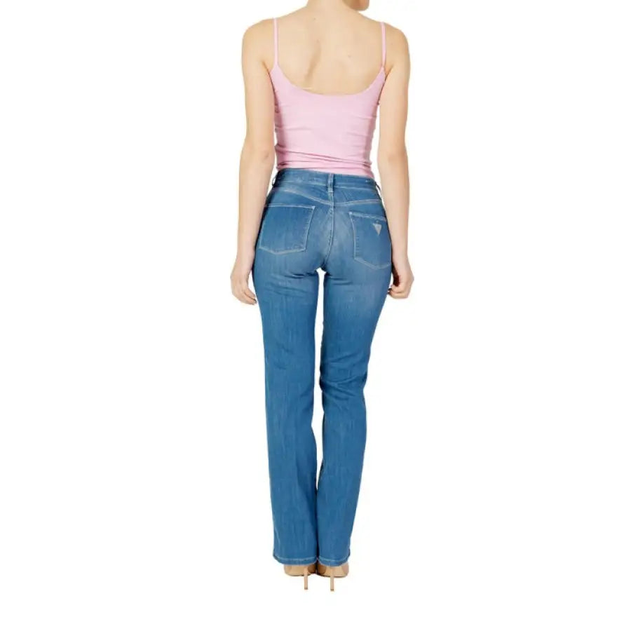 Model wearing Guess Women Jeans in light blue from the Guess Guess collection