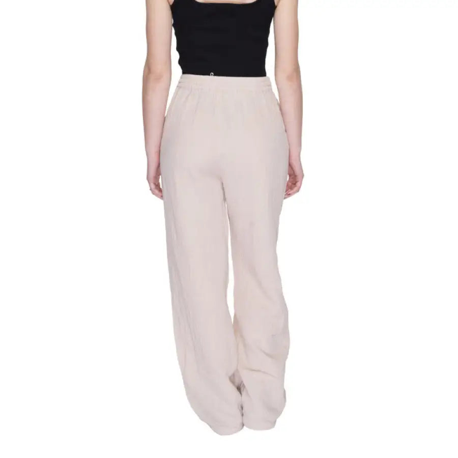 Beige Only Women Trousers showcasing urban city style clothing