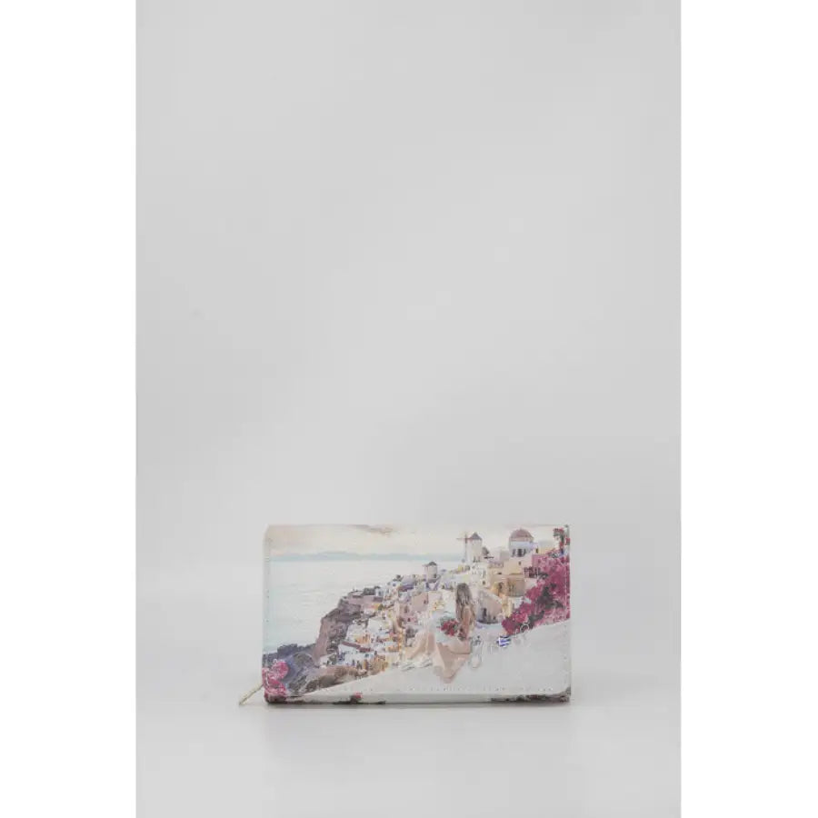 
                      
                        Y Not women’s urban style printed leather wallet in urban city fashion setting
                      
                    