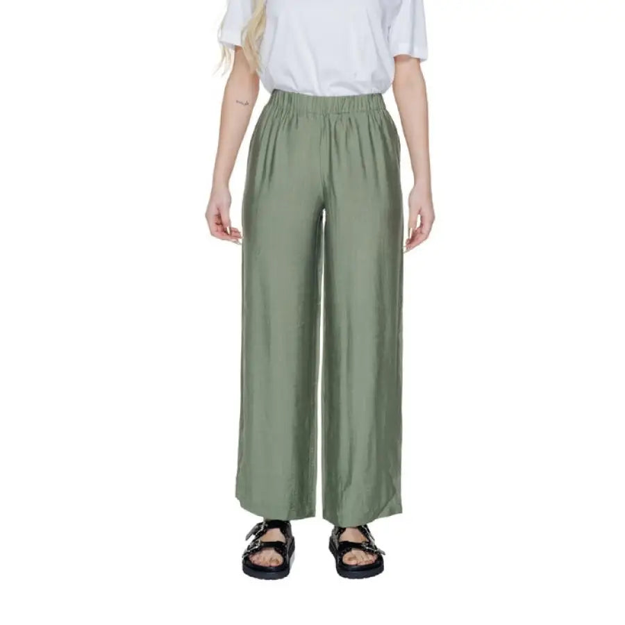 
                      
                        Person in sage Only Women Trousers showcasing urban city style fashion
                      
                    