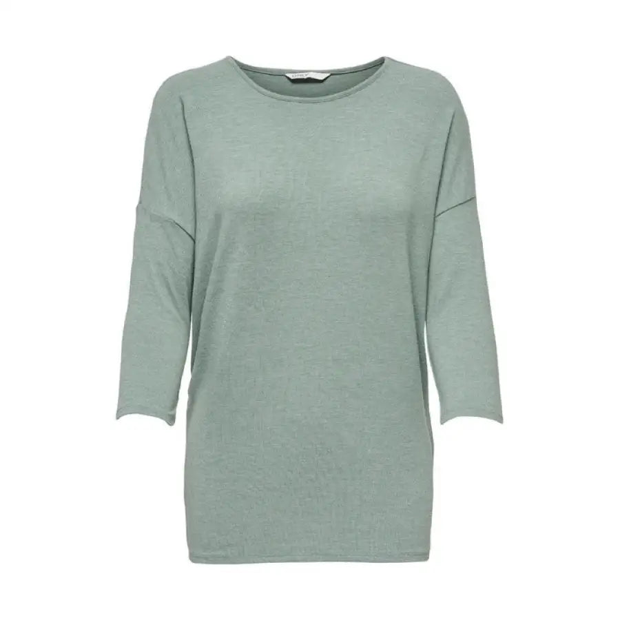 
                      
                        Person in sea green Only Women T-Shirt showcasing urban city style fashion
                      
                    