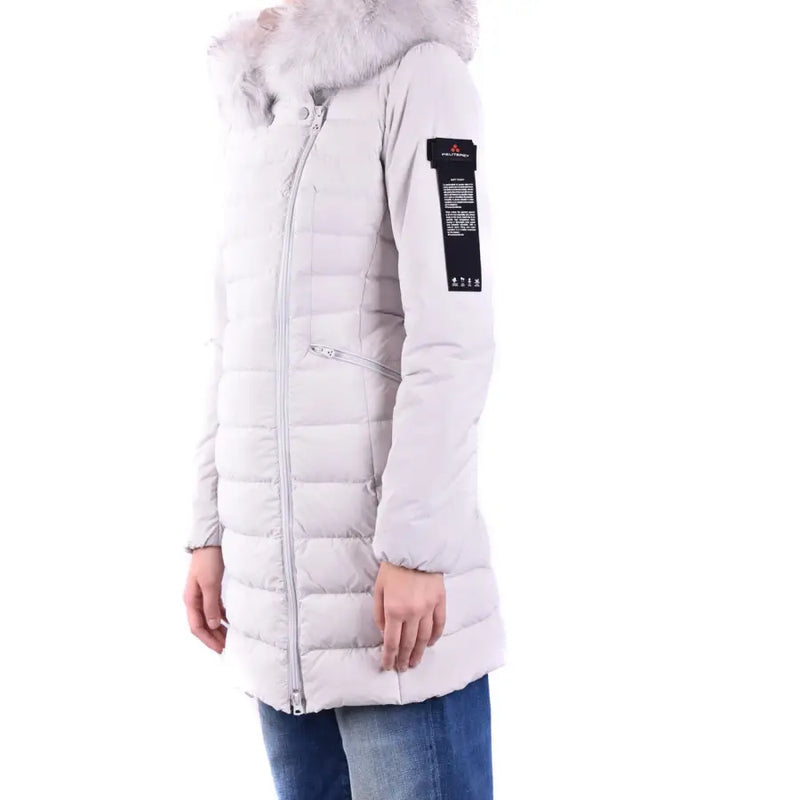 Light gray women’s quilted winter coat with fur-trimmed hood and zipper closure