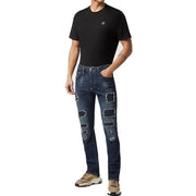 Philipp Plein Herren-Jeans aus blauer Baumwolle mit Rissen im Used-Look, dunkelblauen, abgenutzten Flicken und gesticktem Logo