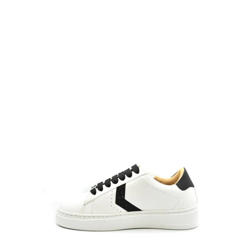Philipp Plein women leather sneakers in white with black laces and a bold black chevron design on the side