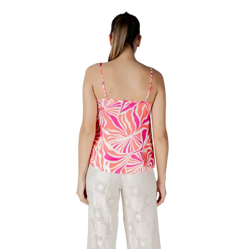 Pink polyester v neck strap top for women featuring vibrant pink and white floral-patterned spaghetti straps