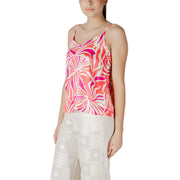 A vibrant coral and fuchsia floral polyester v neck camisole top for women with thin spaghetti straps
