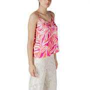 Pink polyester v neck strap top for women with vibrant pink and white abstract leaf pattern and spaghetti straps
