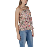 Pink sleeveless B.young women’s cotton tank top with vibrant pink orange and black geometric pattern on beige fabric