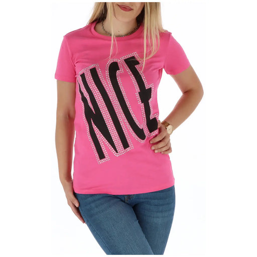 A vibrant pink short-sleeved t shirt with the word nice in bold black letters outlined with sparkling rhinestones