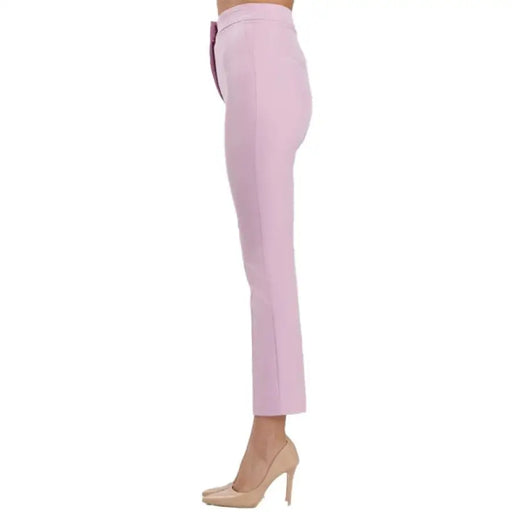 Light Pink High Waisted Trousers paired with nude heels for a stylish look