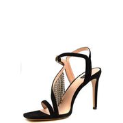 Pinko black suede stiletto sandals with buckle, bow, and metallic stud chain