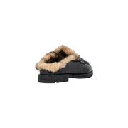 Black leather mule slip-on shoe with tan shearling lining and chunky rubber sole from Pinko women leather slippers black slip