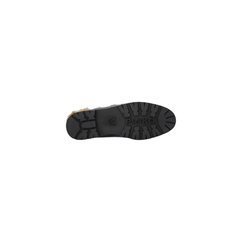 Black rubber sole with deep tread and pinko logo embossed on the back side of pinko women leather slippers black slip