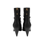 Pinko women black leather ankle boots with gold-tone zippers, distinctive logo, and sleek pointed stiletto heels