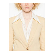 Cream-colored pinko yellow linen blazer with crisp white collar subtle sheen and single button closure