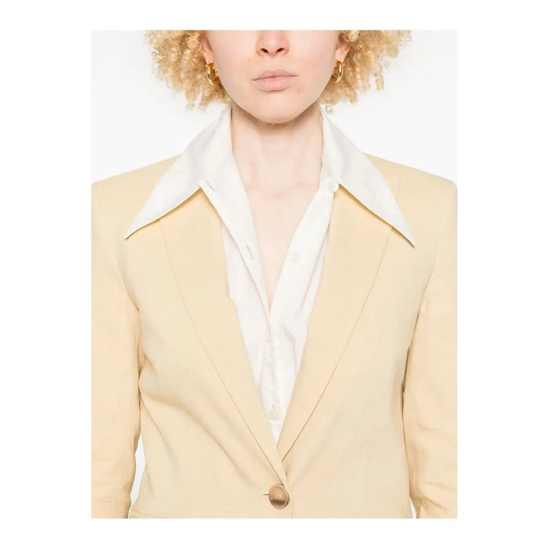 Cream-colored pinko yellow linen blazer with crisp white collar subtle sheen and single button closure