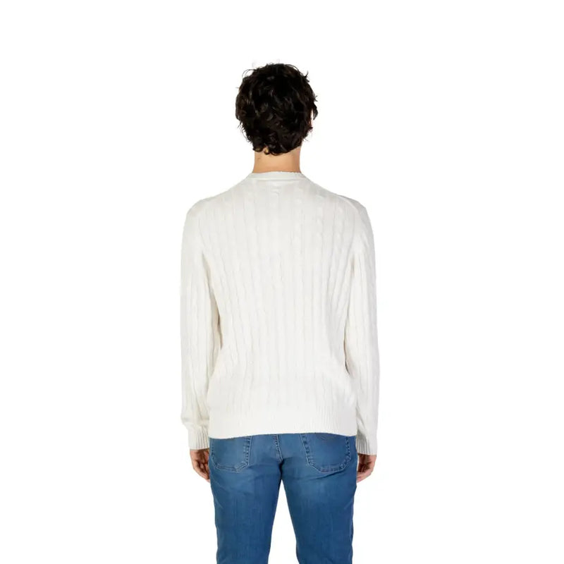 A cream-colored ribbed knit sweater with classic crew neck in soft cotton cashmere blend by US Polo Assn menswear