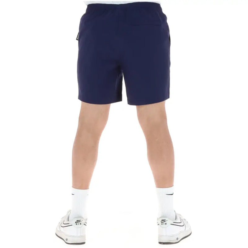 Psycho Bunny Herren-Sportshorts aus marineblauem Polyester mit Kordelzugbund und Seitentaschen für Badebekleidung