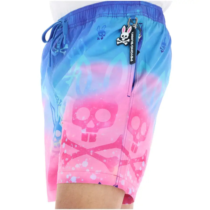 Psycho Bunny Herren-Badehose aus pinkfarbenem Polyester mit blau-pinkem Farbverlauf und Totenkopf-Motiv sowie Taschen