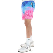 Psycho Bunny Herren-Badehose aus pinkfarbenem Polyester mit leuchtenden Farbverläufen, auffälligen Totenkopf- und weißen Hasenmotiven.
