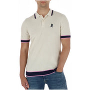 Cream-colored ribbed Psycho Bunny men polo shirt with navy and pink trim and black embroidered rabbit logo in cotton