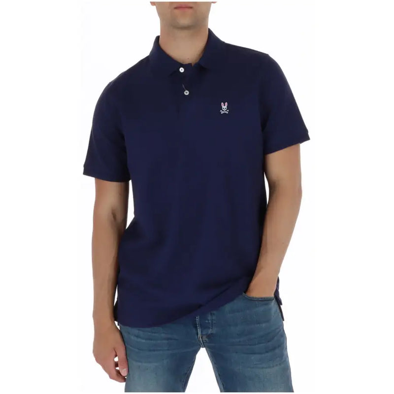 Marineblaues Herren-Polohemd aus Baumwolle mit kurzen Ärmeln und weißem, gesticktem Hasen- und Totenkopflogo auf der linken Brustseite.