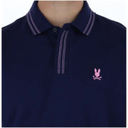 Marineblaues Psycho Bunny Herren-Polohemd aus Baumwolle mit kurzen Ärmeln, weißen Doppelnähten und pinkfarbenem, gesticktem Logo
