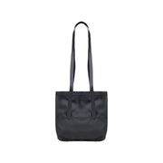 Black nylon tote bag with long handles and minimalist design shown from the back by rains women crossbody bag polyester