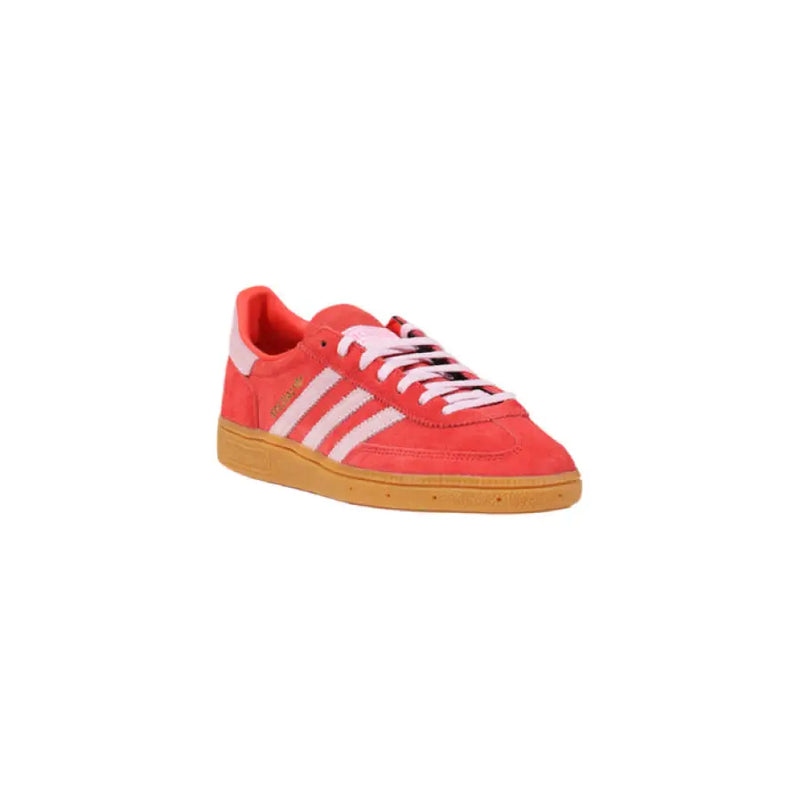 Red Adidas Handball Spezial sneaker with white stripes, designed for sports and style