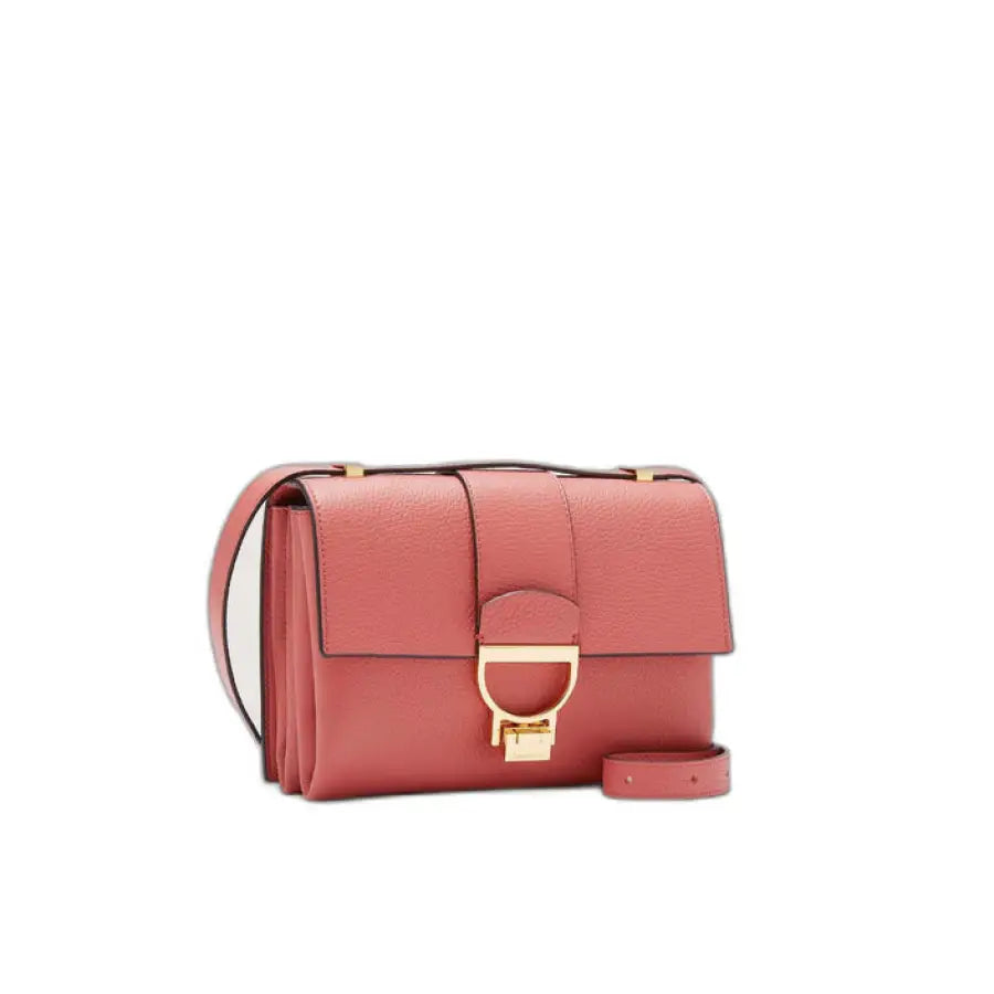 Coccinelle women’s red leather crossbody bag with gold buckle