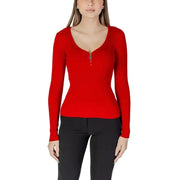 Red long-sleeved top with zipper featured in Morgan De Toi Women’s White Knit Sweater
