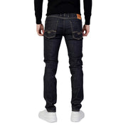 Dark indigo Replay men blue slim fit denim jeans with white stitching and brown leather patch on waistband back side
