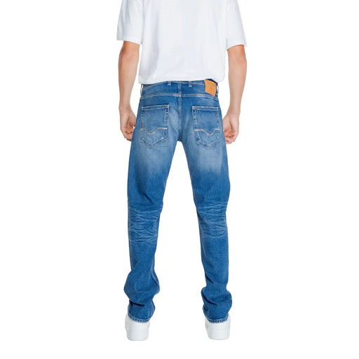 Back view of replay men jeans blue plain zip button ma972p with faded wash, whiskering, classic pockets, and leather patch