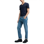 A pair of classic blue denim Replay men jeans with straight-leg cut, rolled cuffs, and light blue zip pockets