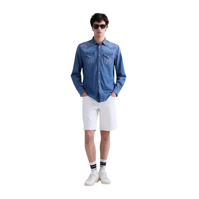 Replay Herrenhemd aus blauem Denim, langärmelig, mit zwei Brusttaschen und geknöpften Manschetten für die Freizeit.