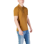 Replay men’s yellow short sleeve polo shirt in mustard yellow with a classic collar and small red chest logo