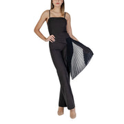 Rinascimento black sleeveless dress with square neckline featuring sheer pleated overlay and flared pants detail