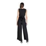 Black sleeveless jumpsuit by Rinascimento with tied waistband and wide-leg pants in a v neck design