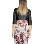 Rinascimento women black polyurethane cropped bolero jacket with three quarter sleeves worn over floral dress