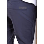 Dark navy blue RRD men polyamide trousers with subtle texture and small rectangular brand label on back pocket backside view