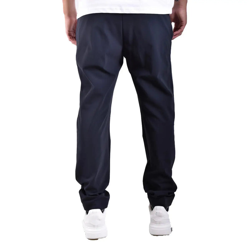 Dark navy blue tapered-fit rrd men polyamide trousers showing the back with smooth glossy fabric and subtle creasing