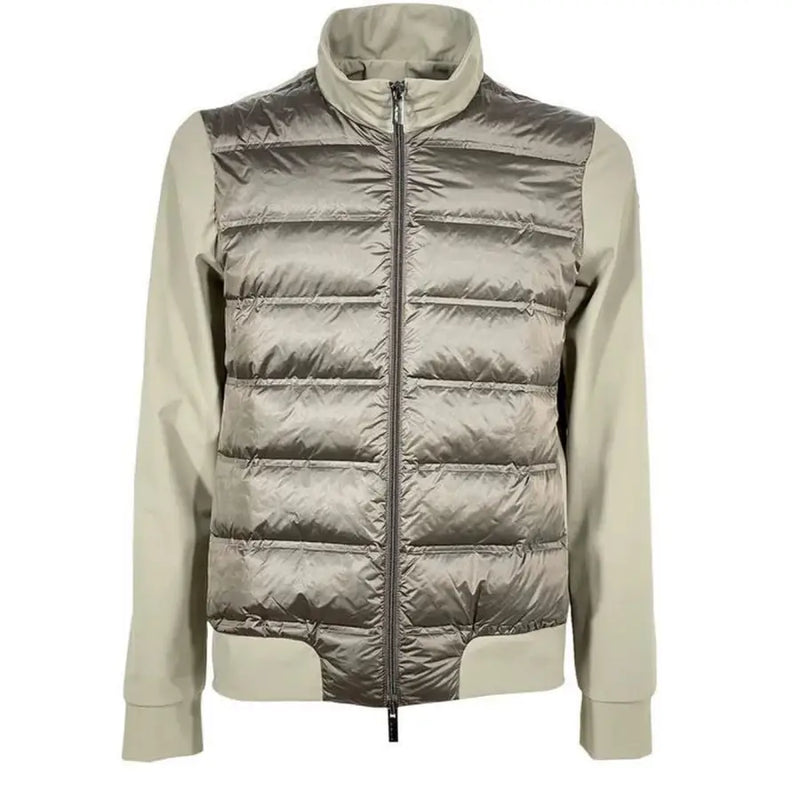 Silver metallic puffer jacket with zipper and contrast sleeves.