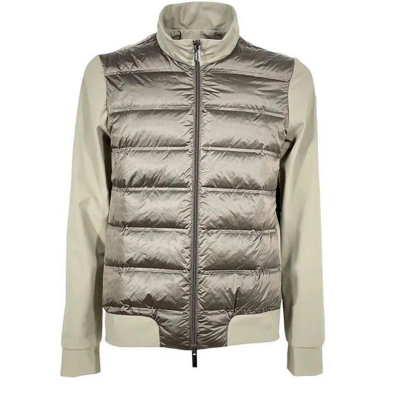 A sleek metallic silver quilted puffer vest with high collar in the RRD men green zip turtleneck jacket spring summer collection