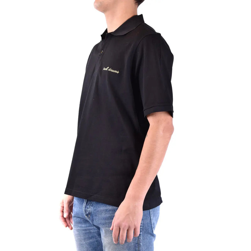 Saint Laurent Baumwollpolo für Herren in Schwarz mit goldener „Just Dreams“-Stickerei auf der linken Brust, Vorderansicht