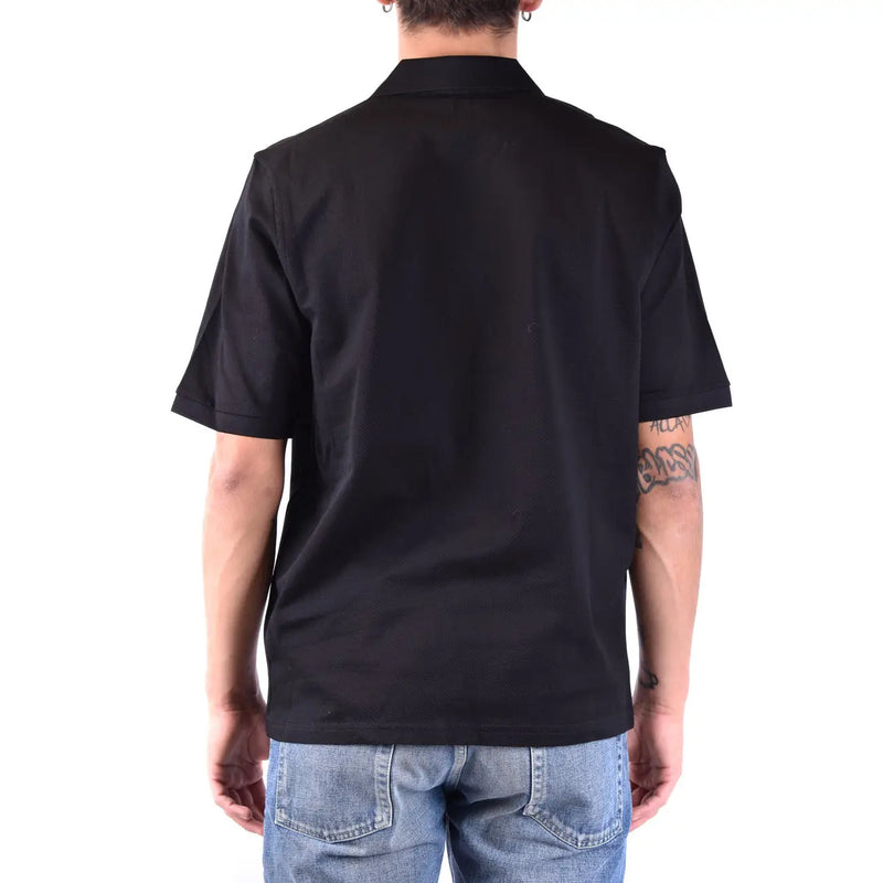 Schwarzes Baumwollpolohemd von Saint Laurent für Herren mit klassischem Kragen und sauber verarbeitetem Saum, Vorderansicht