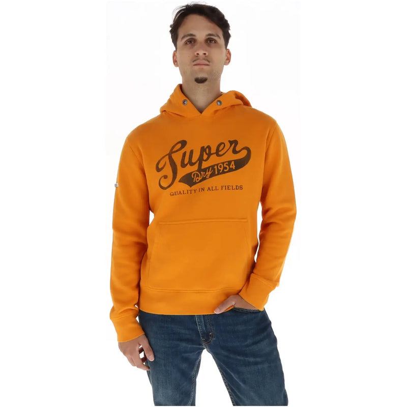 Superdry Grüner Herren-Hoodie aus Baumwollfleece mit orangefarbenem Superdry-Logo und dem Aufdruck „Qualität in allen Bereichen“ auf der Brust