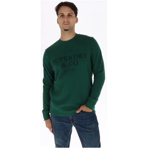Superdry Grünes Herren-Sweatshirt aus Baumwolle mit dunkelgrünen langen Ärmeln und dem Aufdruck „superdry & co“ auf der Brust