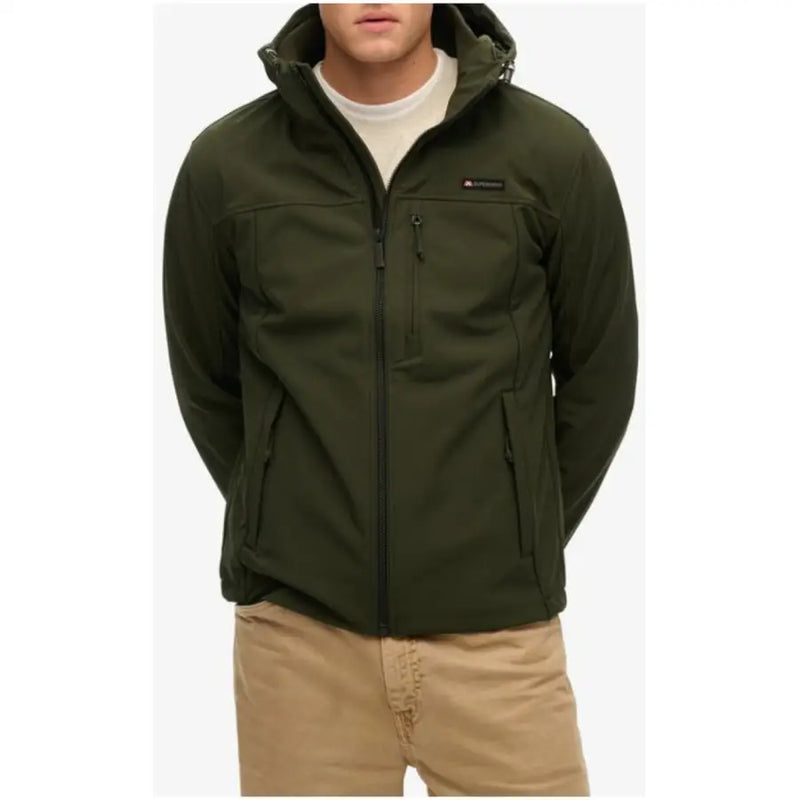 Men’s dark green hooded softshell jacket with full zipper and multiple pockets from Superdry