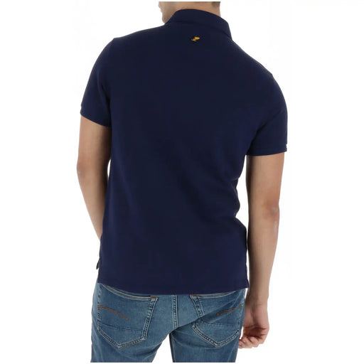 Back view of superdry men polo shirt blue short sleeve cotton with a small gold logo on the collar